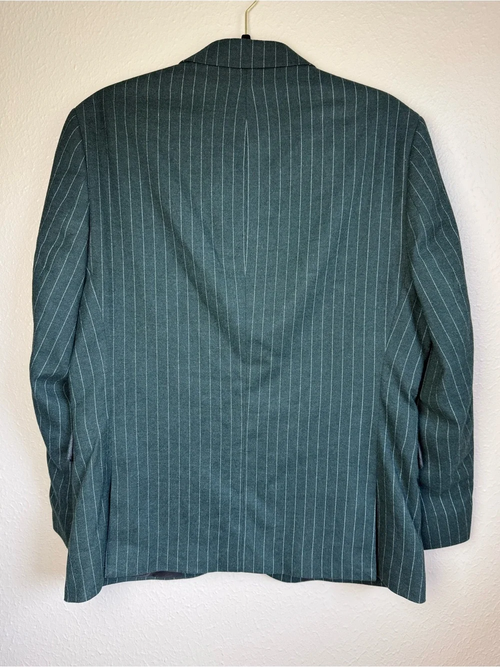 Nick Graham green pinstripe suit blazer